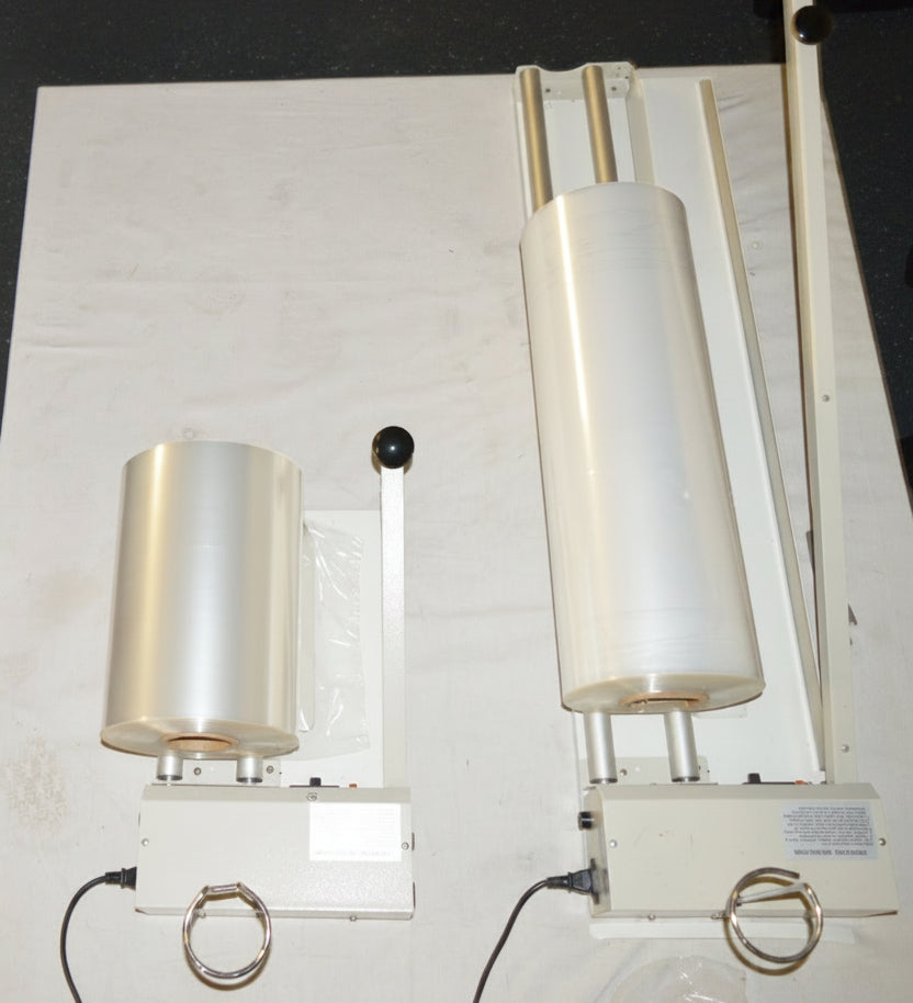 Two I bar Sealers Side by Side One Large and One Small