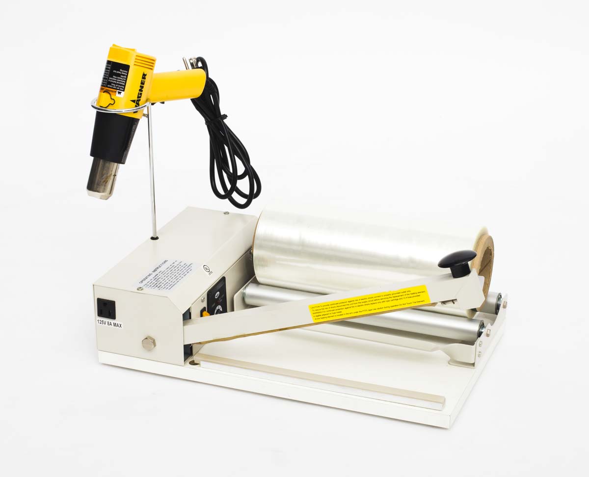 I bar sealer with heat gun and roll of film