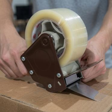 Shield Tape Hot Melt on Dispenser
